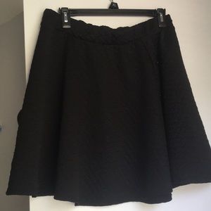 All black. Flare out skirt.